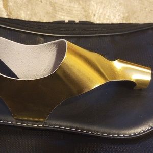 New, never worn gold flat Summer sandals.. beautiful and stylish